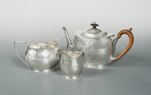 Lot 594 - A mainly Edward VII silver harlequin 3 piece tea service