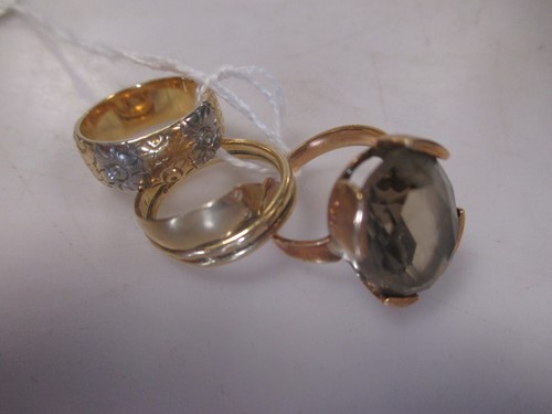 Lot 176 - An 18ct gold two colour wedding ring, an 18ct...