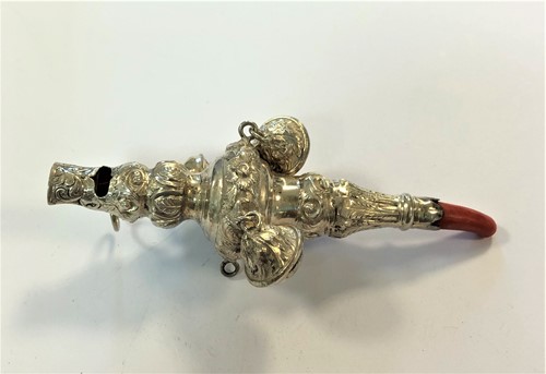 Lot 352 - A silver and coral teething comforter