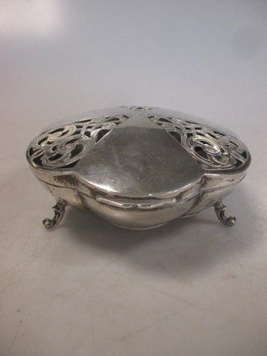 Lot 242 - A silver trinket box with hinged and pierced...