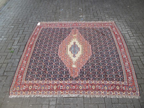 Lot 553 - A square Kelim carpet