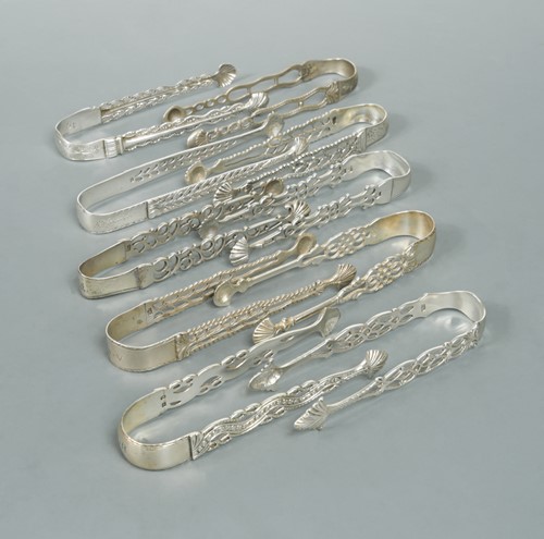 Lot 337 - Ten pairs of George III 18th century cast silver sugar tongs