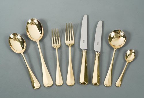 Lot 613 - A canteen containing an 84 piece set of 21st Century silver gilt cutlery and flatware