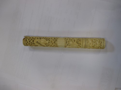 Lot 133 - A Chinese carved ivory cylindrical bodkin case...