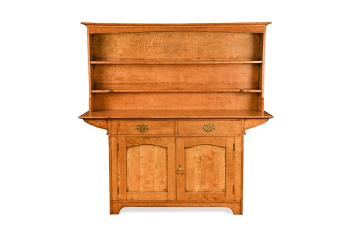 Lot 178 - Liberty & Co., An Arts & Crafts oak 'Cottage' dresser