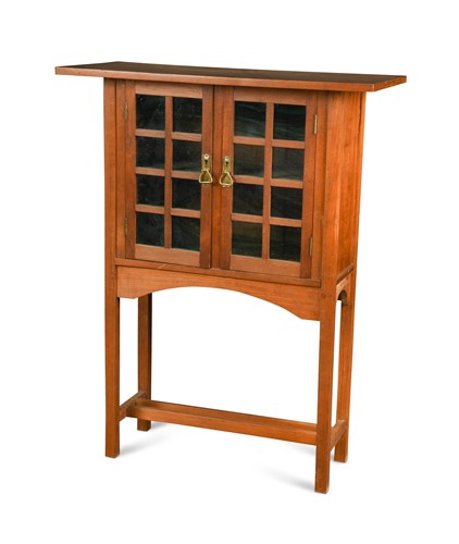 Lot 181 - After George Walton, an Arts & Crafts glazed oak 'Holland' style cabinet