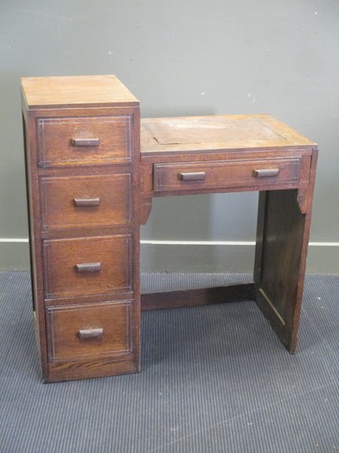 Lot 431 - A Heal's Art Deco oak desk 93 x 92 x 45cm