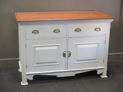 Lot 432 - A painted Art nouveau dresser base 63 x 127 x...