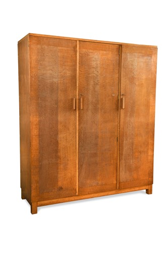 Lot 190 - A Heal's oak triple wardrobe, circa 1930