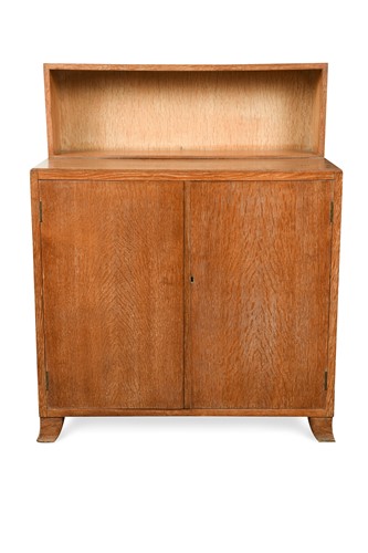 Lot 189 - A Heal's limed oak cabinet with bookcase top