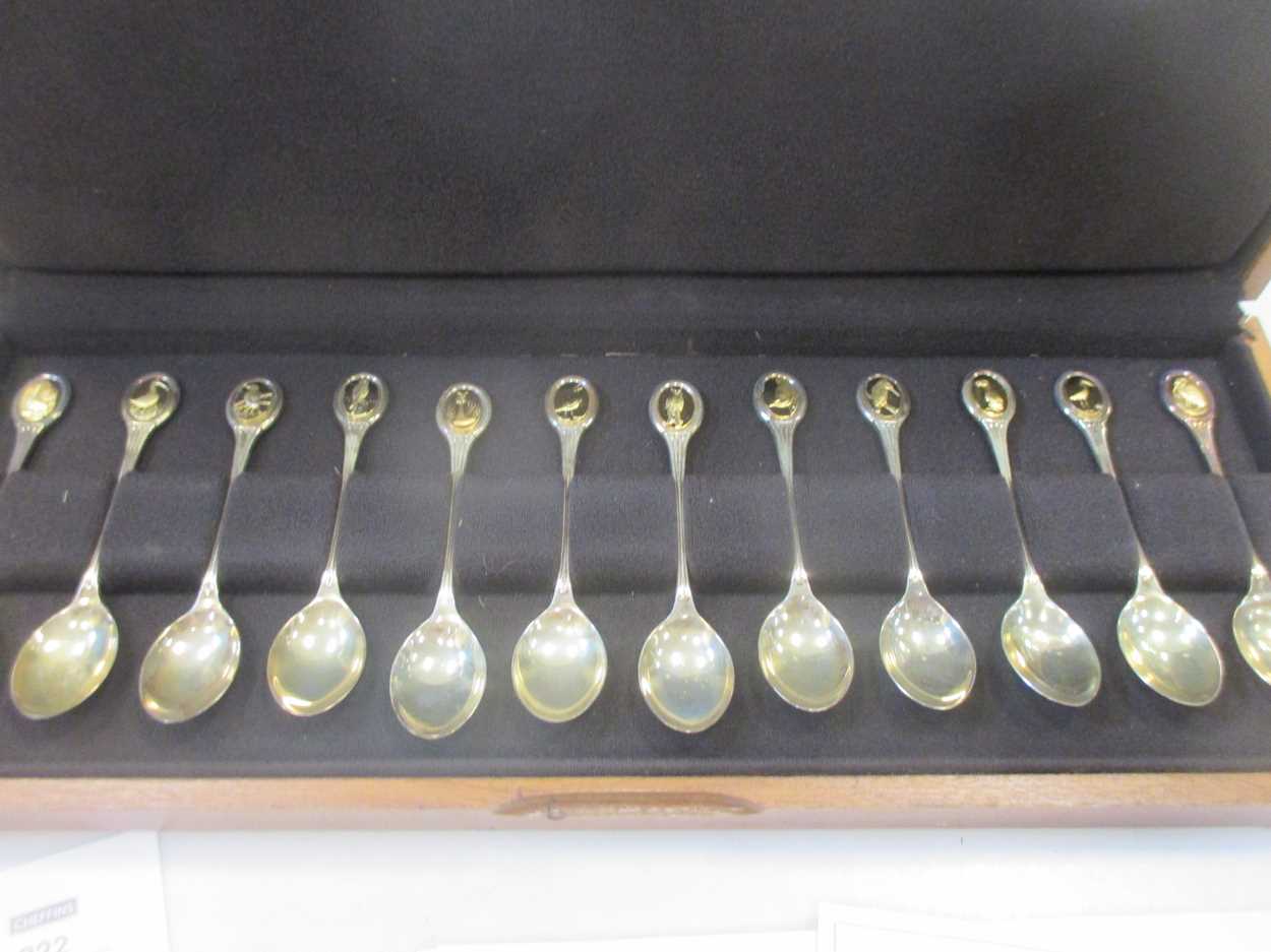 Lot 208 - A cased set of twelve silver RSPB teaspoons