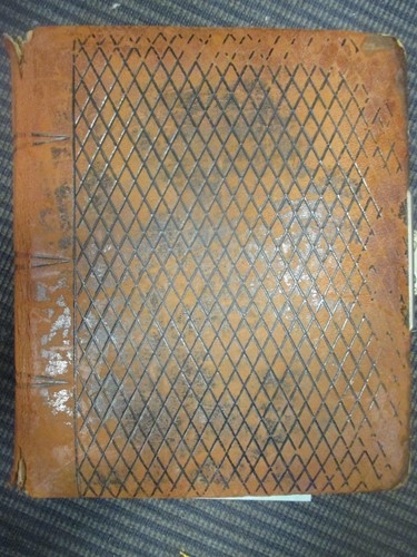 Lot 139 - A Victorian leather photograph album