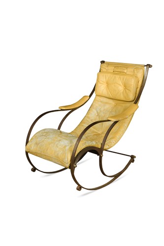 Lot 170 - An early 20th century bent steel rocking chair in the manner of R. W. Winfield