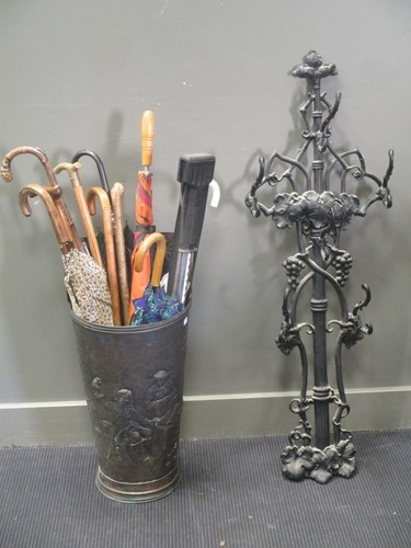 Lot 463 - A copper umbrella stand embossed with a Dutch...