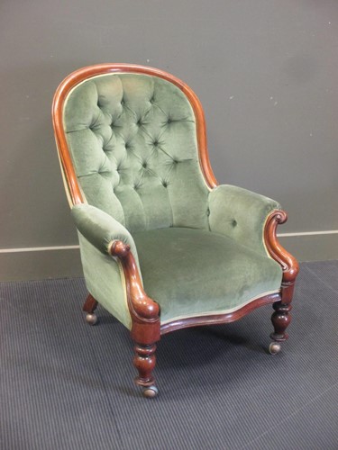 Lot 425 - A Victorian walnut nursing chair, with...