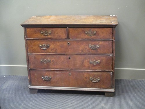 Lot 438 - An 18th century walnut chest of drawers, the...
