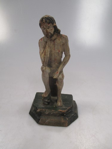 Lot 61 - A small carved figure of Christ