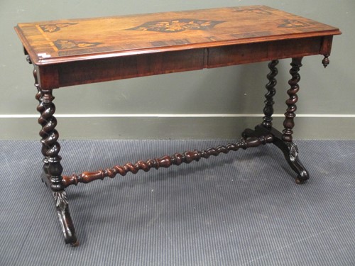 Lot 490 - A 19th century inlaid library table, the...