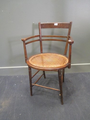 Lot 453 - A Godwinesque chair with caned seat
