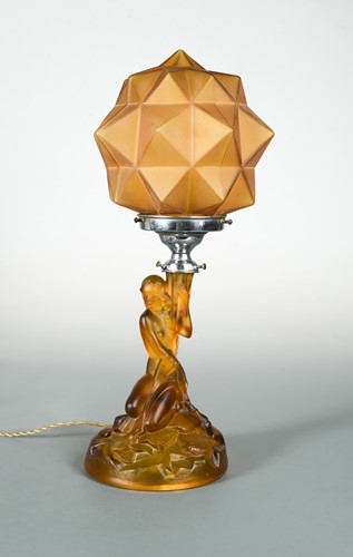 Lot 149 - An Art Deco amber glass table lamp and shade