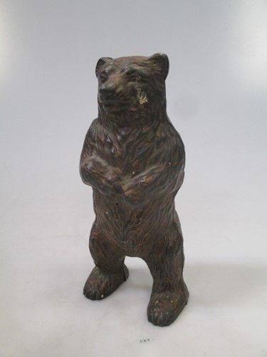 Lot 62 - A bear money box