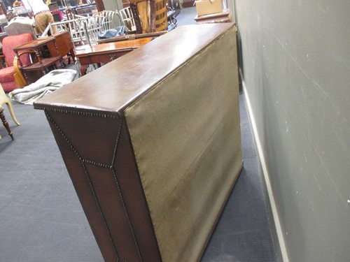 Lot 514 - A leather studded bookcase with adjustable...