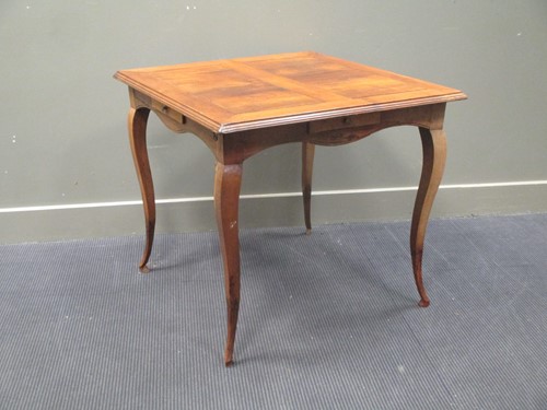 Lot 483 - A 19th century French provincial gaming table...