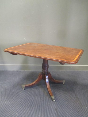 Lot 400 - A Regency mahogany tilt-top breakfast table 71...
