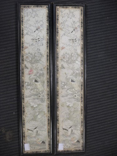 Lot 134 - A pair of Chinese silk embroided panels 49 x 9cm