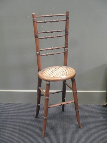 Lot 386 - A 19th century correction chair