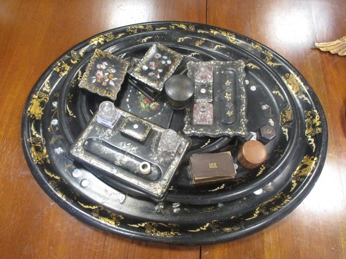 Lot 533 - Three graduated papier maché trays together...