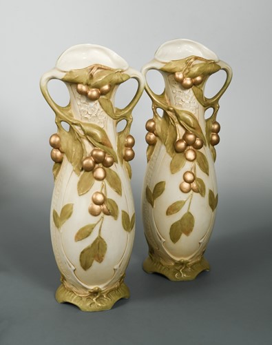 Lot 30 - A pair of Royal Dux Art Nouveau fruiting berry vases, circa 1900