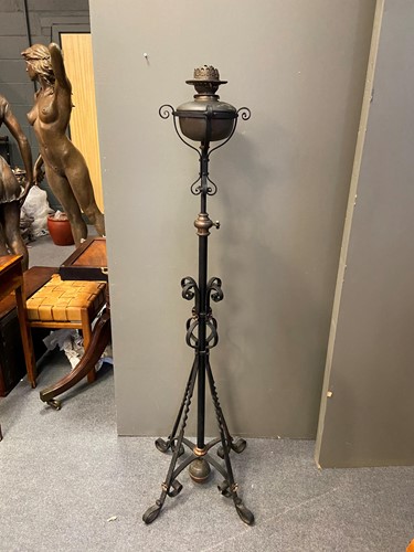 Lot 142 - An Arts & Crafts copper and wrought iron standard lamp in the manner of W/.A.S Benson