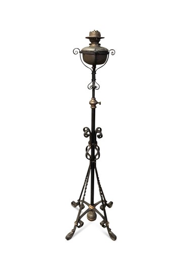 Lot 142 - An Arts & Crafts copper and wrought iron standard lamp in the manner of W/.A.S Benson