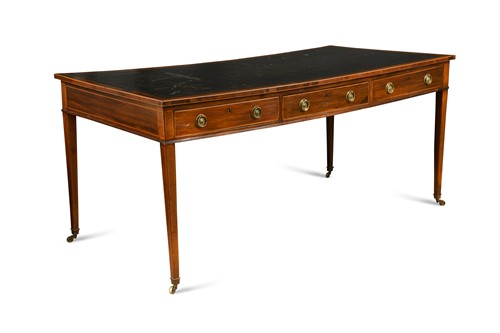 Lot 34 - A large Regency double sided mahogany and boxwood library table
