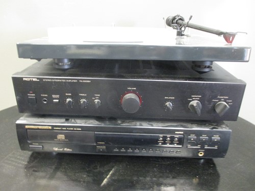 Lot 539 - A Rotel amplifier, CD player by Marantz, and...
