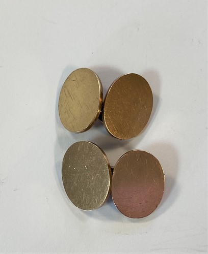 Lot 125 - A pair of oval double-ended cufflinks