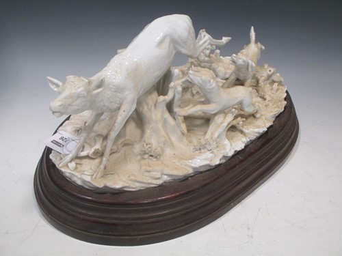 Lot 326 - A Continental porcelain white glazed stag...