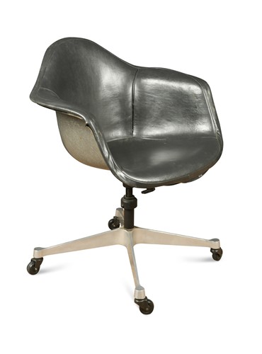 Lot 233 - Charles & Ray Eames, a PACC fibreglass shell swivel armchair