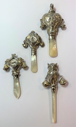 Lot 350 - Two rare George V Scottish silver child's teething rattles and two others