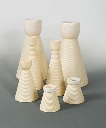 Lot 79 - Colin Saunders (British, 20th century), a collection of conical earthenware candlesticks