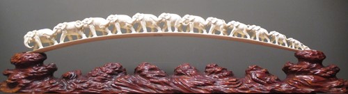 Lot 196 - An ivory elephant tusk carved with twelve...
