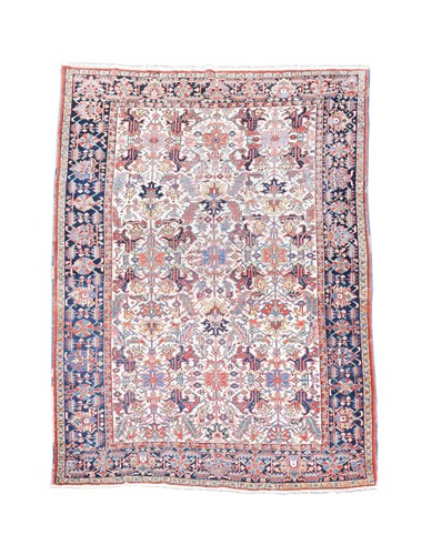 Lot 140 - A Heriz carpet
