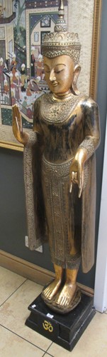 Lot 408 - A modern gilt standing figure of a Thai Buddha,...