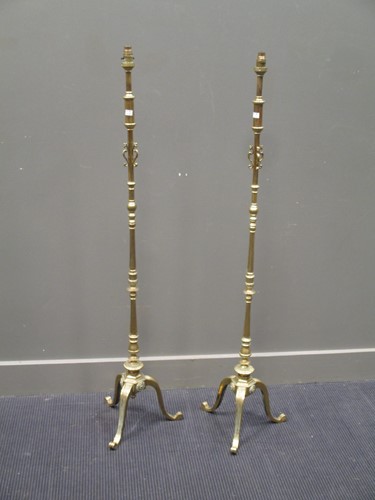 Lot 385 - A pair of brass standard lamps approx 140cm high