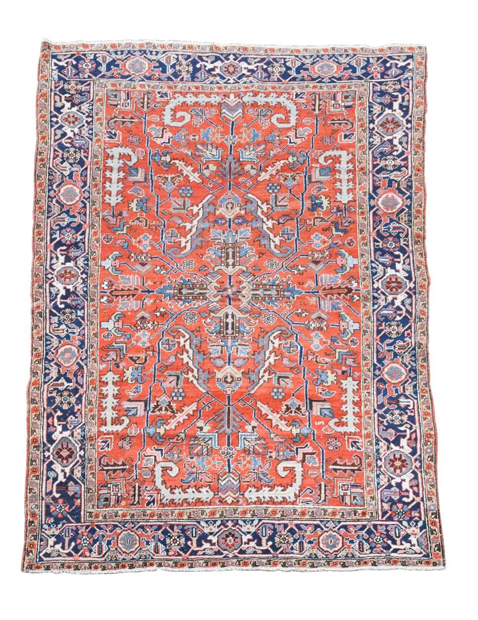Lot 28 - A Heriz carpet,