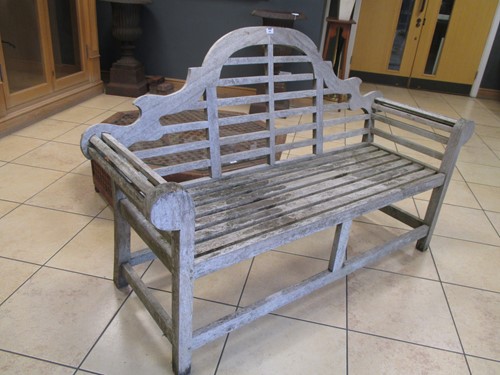 Lot 406 - A Lutyens style modern teak bench, 167cm wide