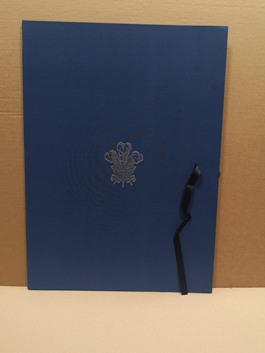 Lot 86 - A linen bound folder to house lithographs by...