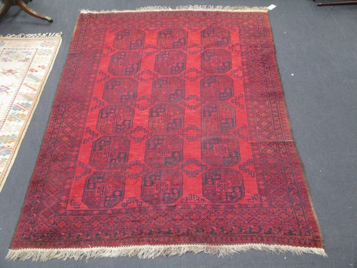 Lot 421 - An Afgan rug 330 x 223cm