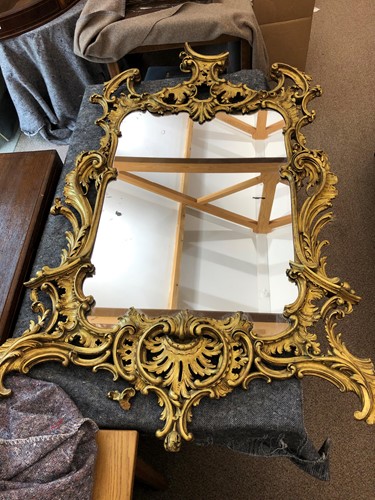 Lot 36 - A carved rococo style giltwood mirror, 19th century